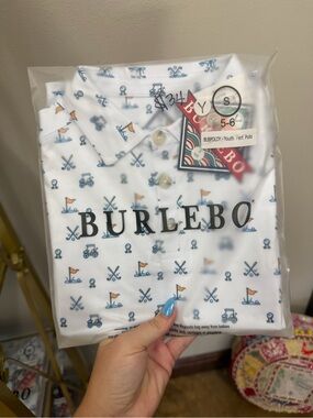 BURLEBO White Youth Polo with Blue & Orange Golf Icons